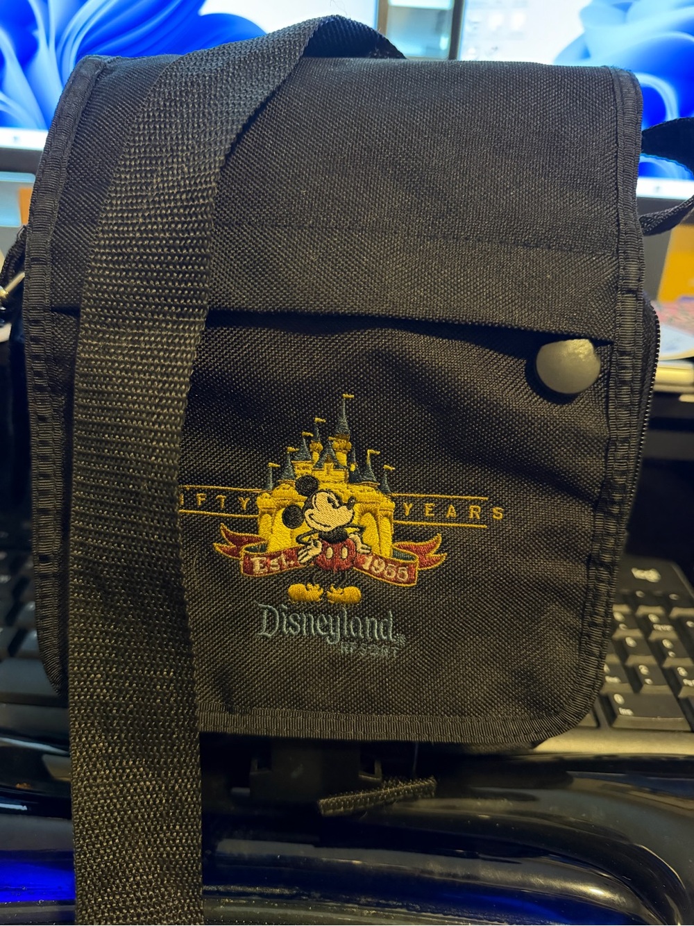 Disneys 50th Anniversary Messenger Bag with Yellow and Red Embroidered